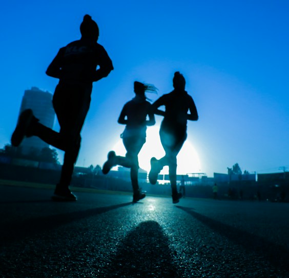 Runners on an open track